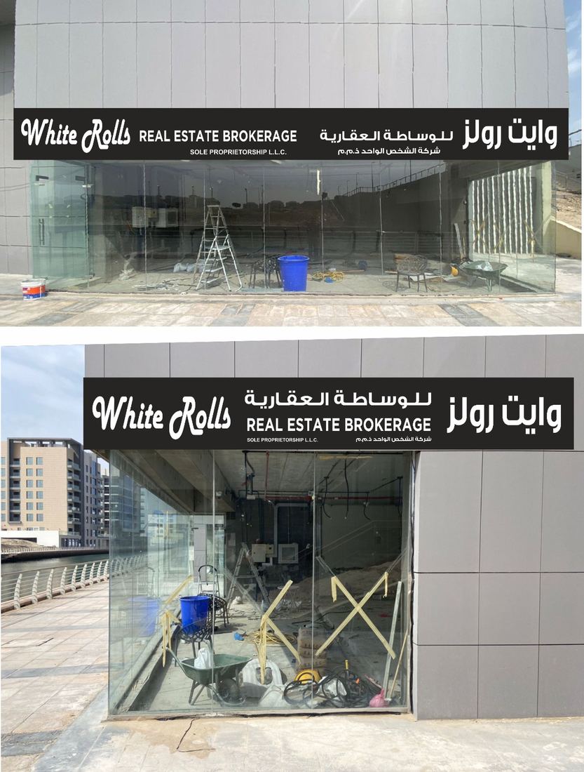 Signage by Faisal Arts for White Rolls Real Estate